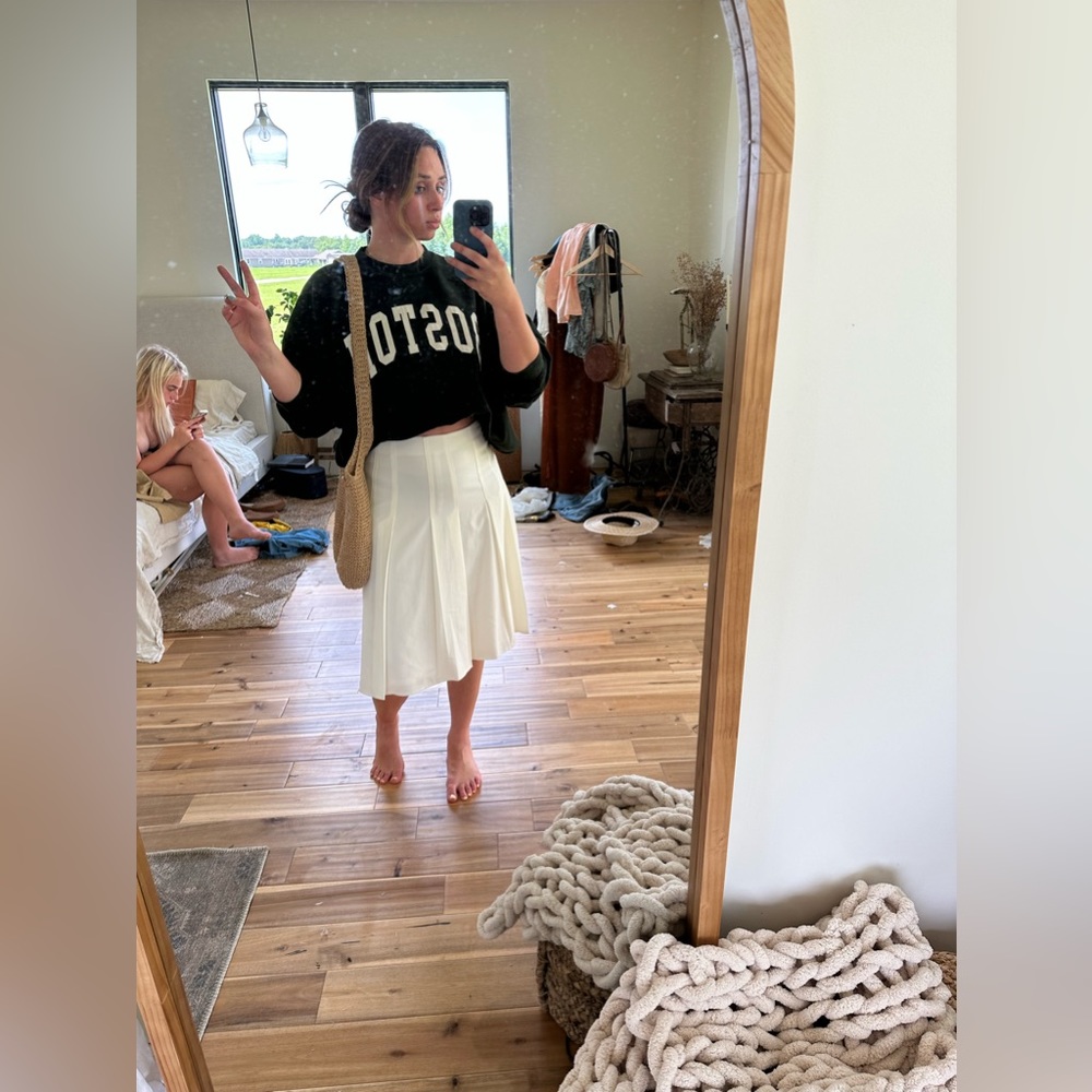 White pleated skirt